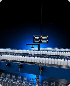 Edge AI camera inspecting parts on a lit production line
